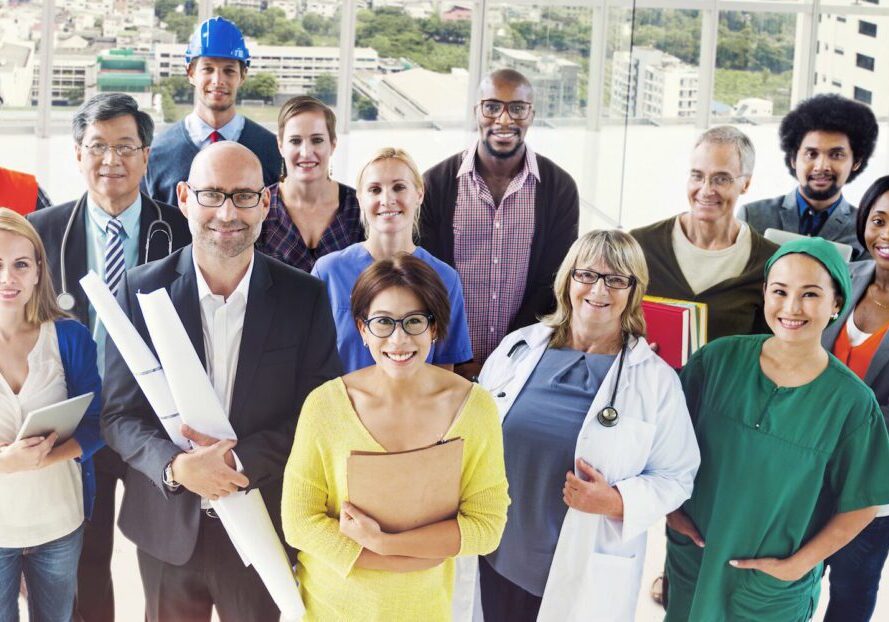 A group of people standing next to each other.